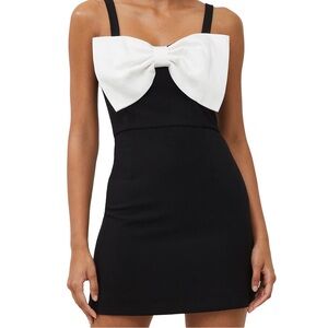 Black dress with White bow! Can be strapless or add straps